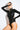 Side view of the Room 24 Jane black bodysuit showing its open-back design, fitted sleeves and tonal leopard finish.