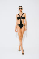 Front view of the Room 24 Camilla black one-piece swimsuit with a bandeau-inspired bust, centre ring detail and curved waist cut-outs.