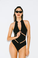 Front view of the Room 24 Maya one-piece swimsuit with a high neckline, full-length zip and illusion-mesh waist panels.