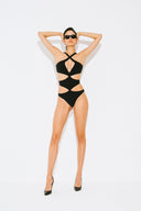 Front view of the Room 24 Jennifer black one-piece swimsuit with a crossover halterneck, plunging neckline and geometric waist cut-outs.