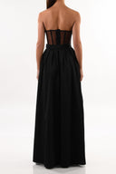 Back view of the Room 24 Diane skirt showing its fitted waistband and flowing full-length construction.