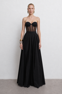 Front view of the Room 24 Diane skirt with a structured waistband, gathered pleats and a voluminous full-length silhouette.