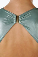 Close-up of the Room 24 Fanny one-piece swimsuit showing its plunge neckline and smooth stretch-fabric construction.