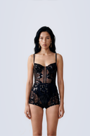 Front view of the Room 24 Kylie black long-sleeve bodysuit with a draped cowl neckline and sheer mesh centre panel.
