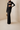 Long black bodycon dress with cut out and gloves.ai_-_kive-image_-_2026-08-18T135145.502