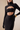 Long black bodycon dress with cut out and gloves.ai_-_kive-image_-_2026-08-18T135153.848