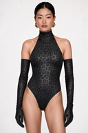 Front view of the Room 24 Giana Bodysuit featuring a high halterneck, sleeveless design, tonal animal pattern and high-cut leg.