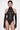 Front view of the Room 24 Giana Bodysuit featuring a high halterneck, sleeveless design, tonal animal pattern and high-cut leg.