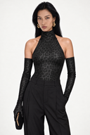 Front view of the Room 24 Giana Bodysuit featuring a high halterneck, sleeveless design, tonal animal pattern and high-cut leg.