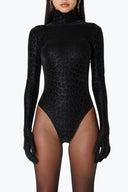 Close-up of the Room 24 Jane black bodysuit showing the raised leopard texture and high turtleneck.