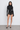 Front view of the Room 24 Jane black bodysuit with a high neckline, long sleeves.