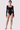 Front view of the Room 24 Jess black long-sleeve bodysuit with a square neckline and sculpted close fit.