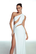 Front view of the Room 24 Joanna white maxi dress with a one-shoulder neckline, sweeping cut-outs and thigh-high split.