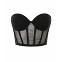 Close-up of the Room 24 Kelly corset showing the sweetheart neckline, sheer mesh panels and exposed boning.