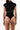 Back view of the Room 24 Rene black short-sleeve bodysuit highlighting its high collar and streamlined silhouette.