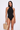 Front view of the Room 24 Lea one-piece swimsuit with a high halterneck, sculpted fit and high-cut legs.