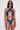 Side view of the Room 24 Carol one-piece highlighting its wrapped construction, open torso and sculpting fit.