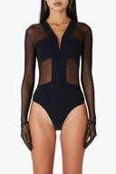 Front view of the Room 24 Maria black mesh bodysuit with sheer long sleeves, opaque bust panels and a central zip.