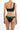 Back view of woman wearing black one-shoulder bikini with green print accents