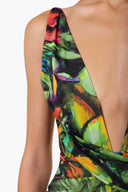 Close-up of the Room 24 Amelia swimsuit showing its deep plunge neckline and layered crossover construction.