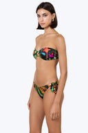 Side view of the Room 24 Stella reversible bikini bottom highlighting its knotted detail and high-cut shape.