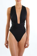Front view of the Room 24 Rachel one-piece swimsuit with a deep plunge neckline, gathered halterneck and crossover waist.