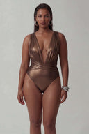 Front view of the Room 24 Rachel one-piece swimsuit with a deep plunge neckline, gathered panels and crossover waist.