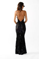 Back view of the Room 24 Rossana black sequin lace maxi dress highlighting its deep V-back and full-length flared hem.