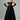 Woman in strapless black lace corset evening dress with long black gloves, studio background
