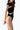 Side view of the Room 24 Clara black bodysuit highlighting its asymmetric draping and waist cut-out.