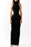 Front view of the Room 24 Camilla black halterneck maxi dress with sculpted waist cut-outs and a fitted silhouette.