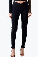 Front view of the Room 24 Angela trousers with a V-shaped waistband and sculpted slim-leg silhouette.