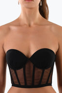 Front view of the Room 24 Kelly corset with a sweetheart neckline, underwired cups, sheer mesh panels and structured boning.