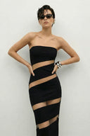 Front view of the Room 24 Sienna black strapless midi dress with diagonal illusion-mesh panels and a sculpted bodycon fit.