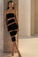 Front view of the Room 24 Sienna black strapless midi dress with diagonal illusion-mesh panels and a sculpted bodycon fit.