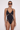 Front view of the Room 24 Tammy one-piece swimsuit with a plunging V-neckline, double straps and geometric illusion-mesh panels.