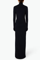 Back view of the Room 24 Talia black corset dress showing its high neckline, fitted glove sleeves and sculpted maxi silhouette.