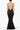 Back view of the Room 24 Vanessa black lace maxi dress highlighting its delicate straps, dramatic low V-back and flared hem.