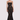 Front view of the Room 24 Vanessa black lace maxi dress with a straight neckline, fine straps and fitted floral-lace silhouette.