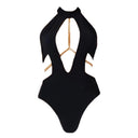 Close-up of the Room 24 Adriana swimsuit showing the plunging front opening and delicate chain detailing.
