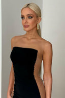 Side view of the Room 24 Madison black dress showing its sheer mesh panel, subtle ruching and body-contouring fit.