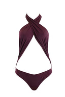 Close-up of the Room 24 Carol swimsuit showing its crossover halterneck and softly gathered stretch-fabric panels.