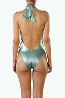 Back view of the Room 24 Carol swimsuit showing its low open back, halterneck ties and sculpted silhouette.