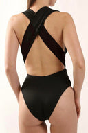 Back view of the Room 24 Rachel one-piece swimsuit showing its halterneck construction, open back and close-fitting silhouette.
