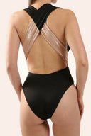 Back view of the Room 24 Rachel one-piece swimsuit showing its halterneck construction, open back and close-fitting silhouette.